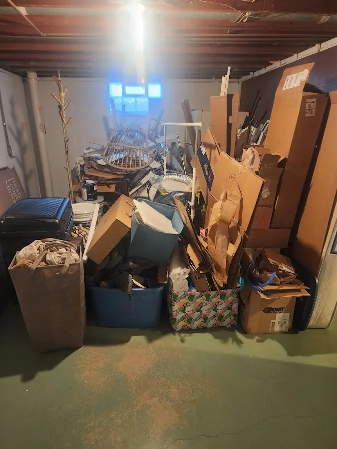 Roll-off dumpster container at job site for 2 Yard Dumpster Rental in New Orleans